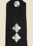 Epaulette with two squares on it, positioned diagonally like the diamond in a deck of cards
